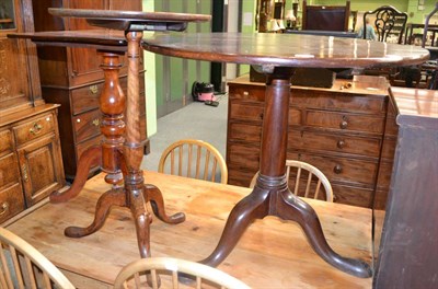 Lot 1220 - A Georgian mahogany tripod table, mahogany tilt-top tripod table and another with rectangular...