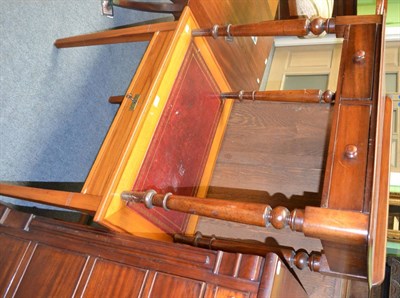 Lot 1222 - Mahogany two drawer side table and a writing table with red leather top (2)