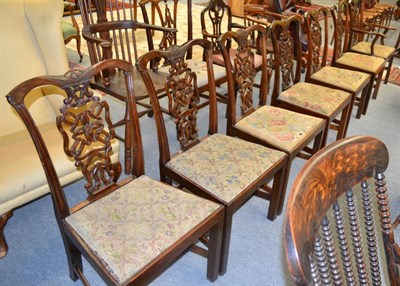 Lot 1275 - A set of seven mahogany chairs including one carver