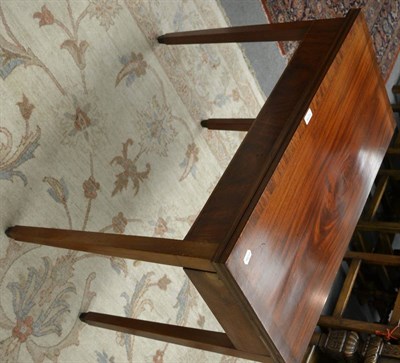 Lot 1279 - A 19th century mahogany inlaid fold over tea table