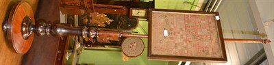 Lot 1286 - A 19th century rosewood pole stand with alphabet sampler dated 1829