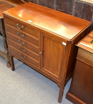 Lot 1300 - A mahogany music cabinet