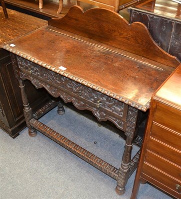 Lot 1301 - An 18th century oak side table fitted with one drawer