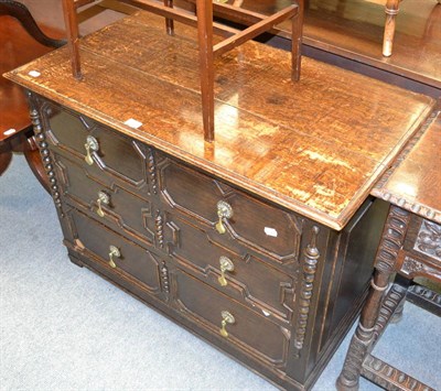 Lot 1303 - Stained oak panelled three height chest