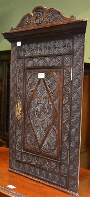 Lot 1308 - A Victorian carved hanging corner cupboard