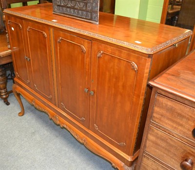 Lot 1309 - A walnut cocktail cabinet