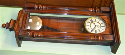 Lot 1313 - A Vienna type double weight driven wall clock