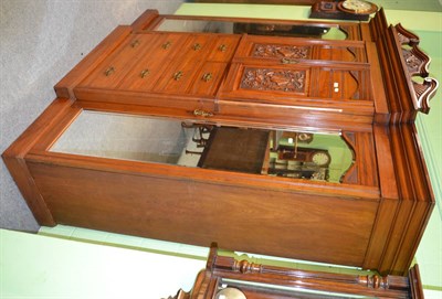 Lot 1314 - Victorian walnut triple wardrobe