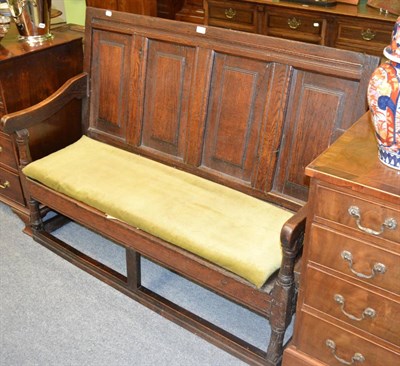 Lot 1329 - Panelled oak settle