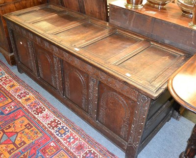 Lot 1332 - Late 18th century carved oak coffer