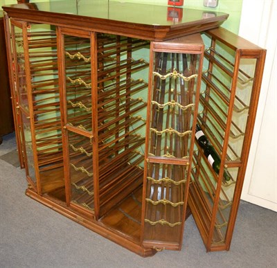 Lot 1334 - A late 19th century oak glazed spool cabinet with gilt metal fittings Maker: Exhibition...