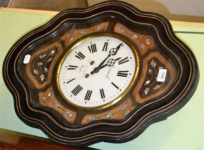 Lot 1345 - A French striking ebonised and mother-of-pearl inlaid wall clock