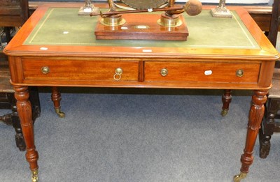 Lot 1350 - A Victorian mahogany stained two drawer writing table