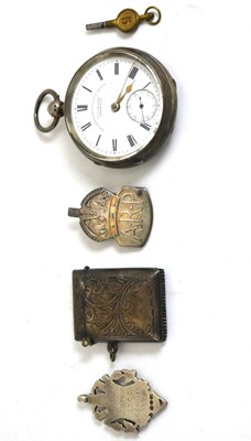 Lot 2 - A silver pocket watch, vesta and a medal