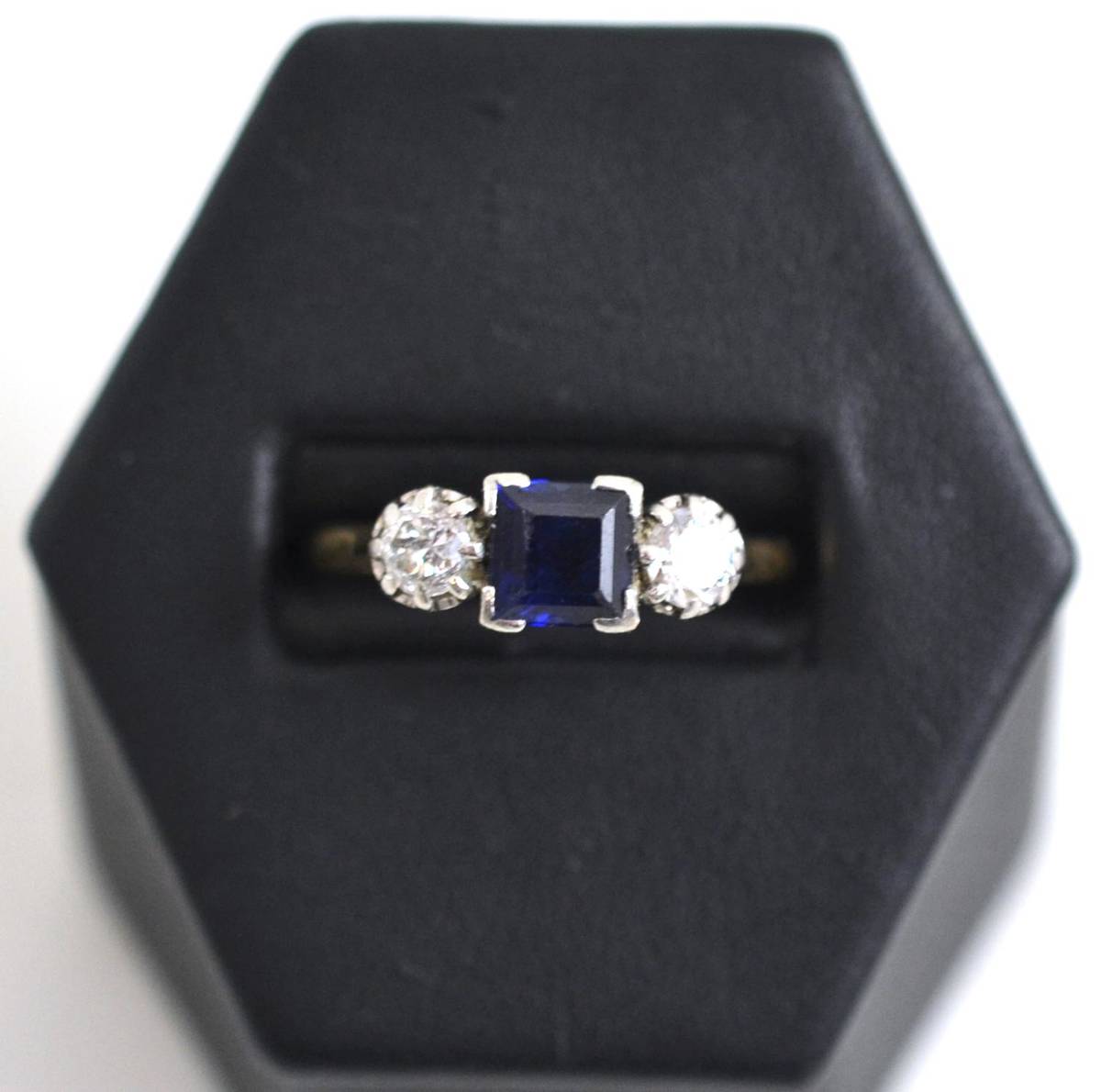 Lot 21 - A sapphire and diamond three stone ring, stamped '18CT' and 'PLAT'