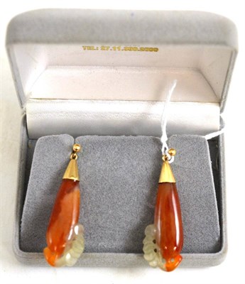 Lot 39 - A pair of two colour jade earrings