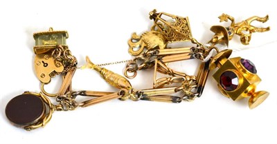 Lot 40 - A watch chain stamped '375' with attached 9ct gold charm and two loose 9ct gold charms of a...