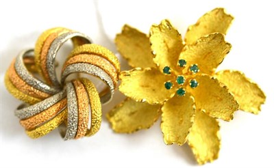 Lot 41 - An 18ct three colour gold brooch and an 18ct gold emerald set floral brooch