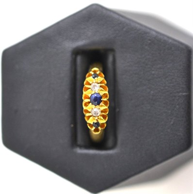 Lot 44 - An 18ct gold sapphire and diamond ring