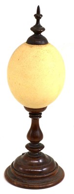 Lot 61 - A treen mounted ostrich egg