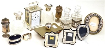 Lot 64 - A collection of silver and white metal, a Victorian silver mounted scent, carriage clock etc
