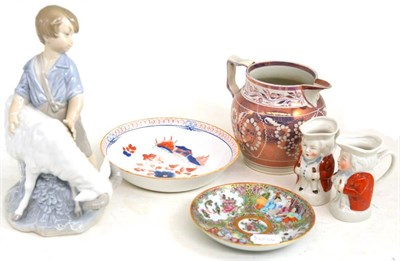 Lot 74 - A group including 19th century Staffordshire toby jugs, lustre jug and dish together with a Nao...