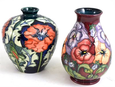 Lot 79 - A modern Moorcroft poppy pattern vase (second) and another pansy pattern vase (second)