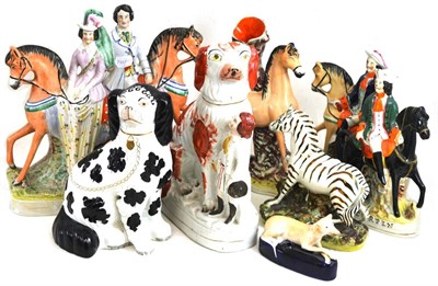 Lot 94 - A group of eight Staffordshire flat back figures