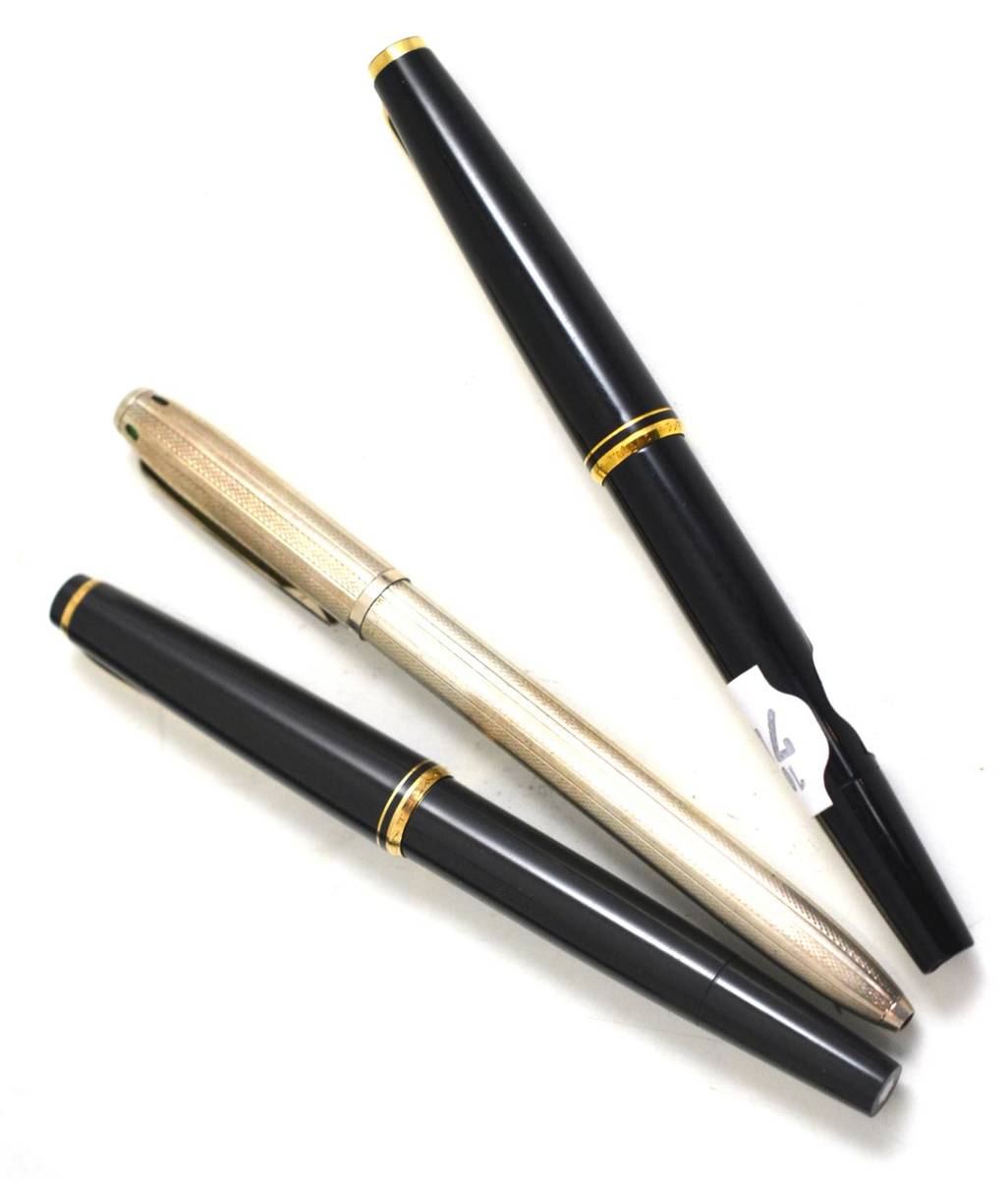 Lot 338 - A silver Dunhill multi colour ball pen and two Mont Blanc classic pens