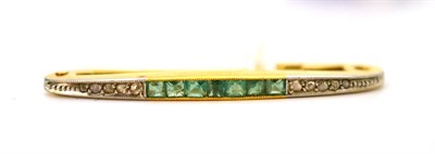 Lot 5 - An emerald and diamond bar brooch