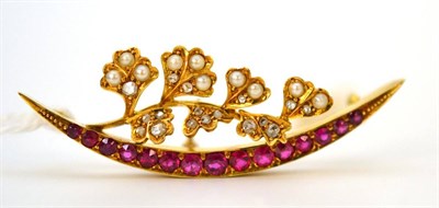 Lot 6 - A ruby, seed pearl and diamond crescent brooch