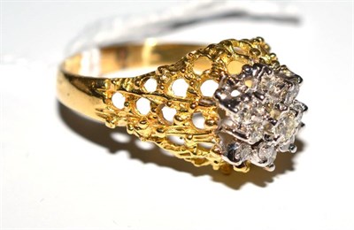 Lot 20 - An 18ct gold diamond cluster ring, total estimated diamond weight 0.66 carat approximately
