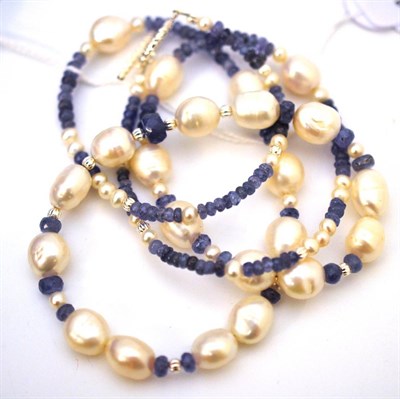 Lot 26 - A tanzanite and cultured pearl necklace