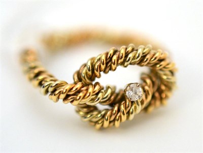 Lot 27 - A 9ct gold diamond set rope twist ring