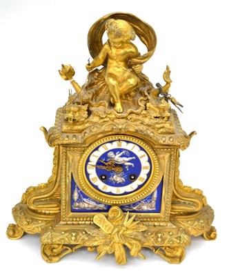 Lot 82 - A gilt metal and porcelain mounted mantel clock