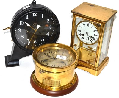 Lot 92 - A four glass mantel clock, Seth Thomas ships type clock and a metal cased mantel timepiece (3)