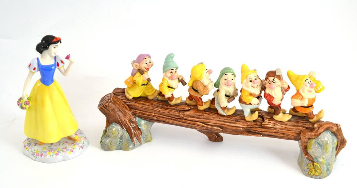 Lot 310 - Royal Doulton group Snow White ";Heigh Ho"; SW31 and ";Snow White"; DP5 (2)
