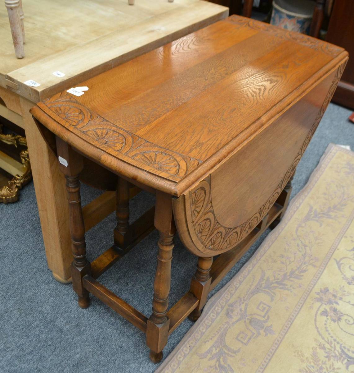 Lot 1089 - Reproduction mahogany cocktail cabinet, a