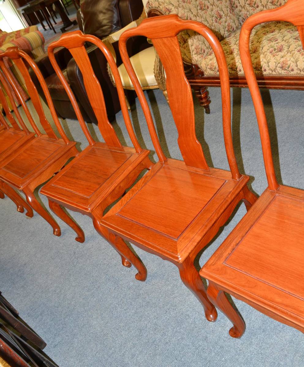 Lot 1327 - A set of six Chinese hardwood dining chairs