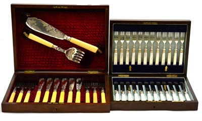 Lot 11 - Set of plated dessert eaters with mother-of-pearl handles together with fish eaters, both cased