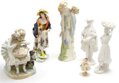 Lot 18 - A Lladro figure of a girl with flowers, a Royal Doulton reflections figure - Summer Darling,...