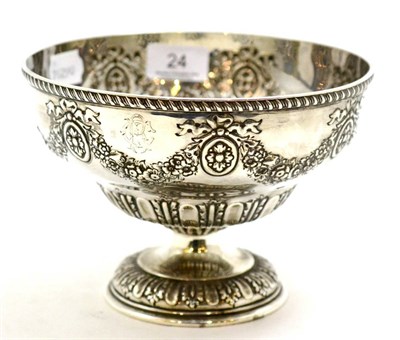 Lot 24 - A silver rose bowl with embossed garland decoration