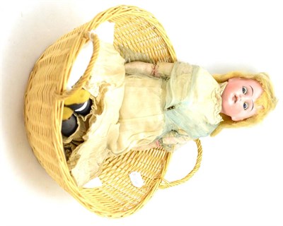 Lot 39 - German bisque shoulder head doll in basket