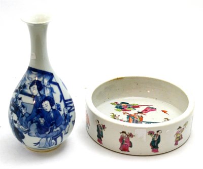 Lot 42 - A Chinese porcelain blue and white bottle vase together with a polychrome bowl (2)