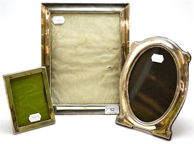 Lot 52 - Large silver mounted photograph frame on easel back, oval shaped silver frame and another...