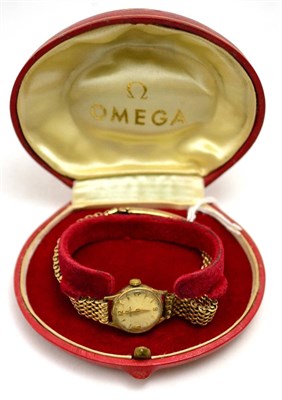 Lot 60 - A lady's 9ct gold wristwatch signed Omega, in fitted case