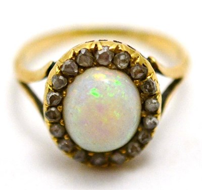 Lot 73 - An opal diamond cluster ring