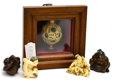 Lot 80 - Two early 20th century Japanese ivory netsukes, two wooden netsukes and a Victorian ivory...