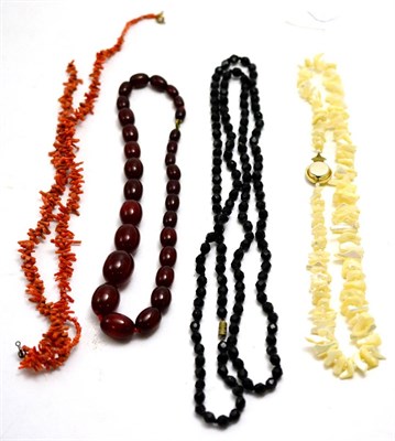 Lot 81 - Amber beads, a jet necklace and two coral necklaces