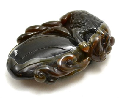 Lot 88 - A Chinese carved banded agate figure of a Qilin